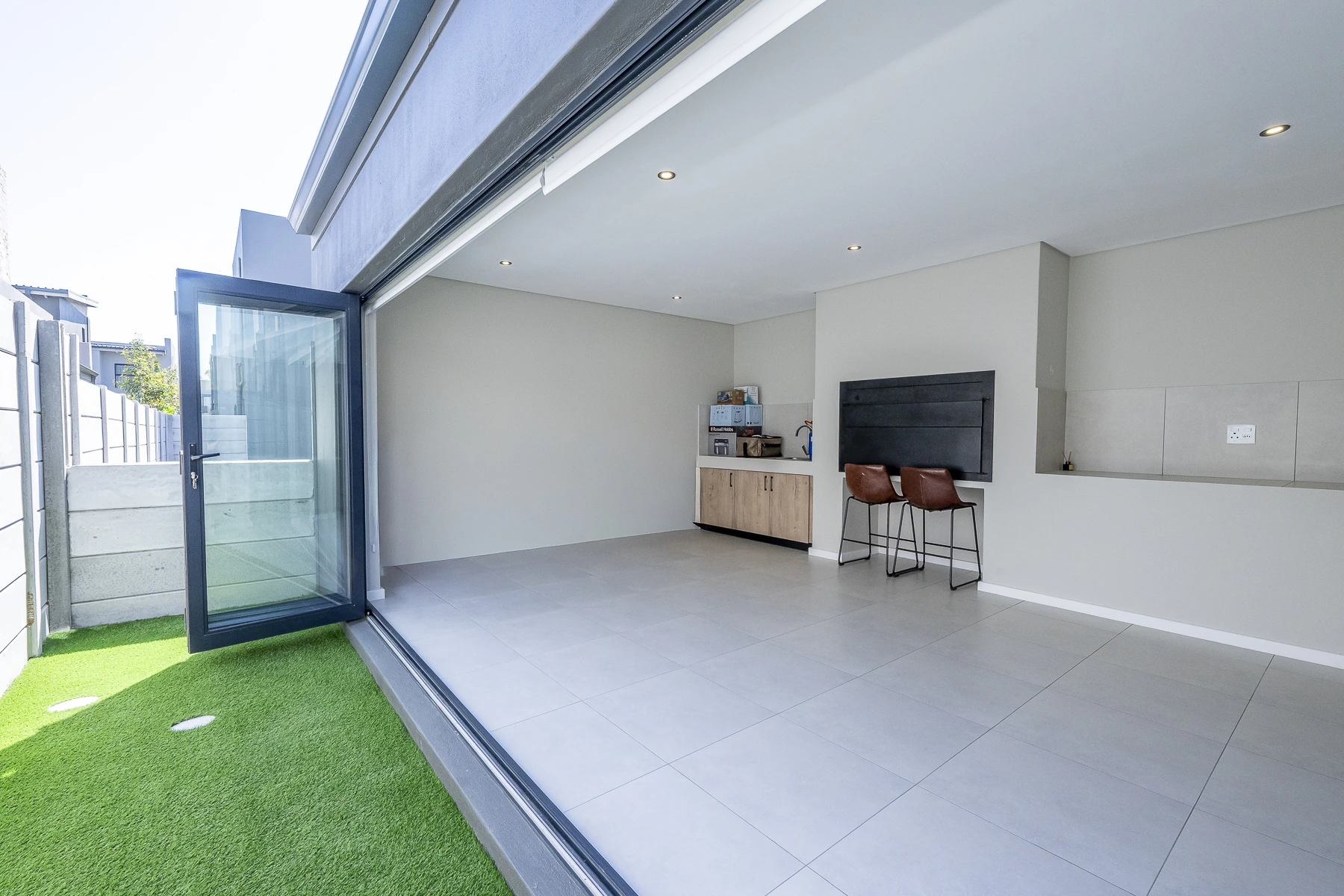 Indoor outdoor entertainment area