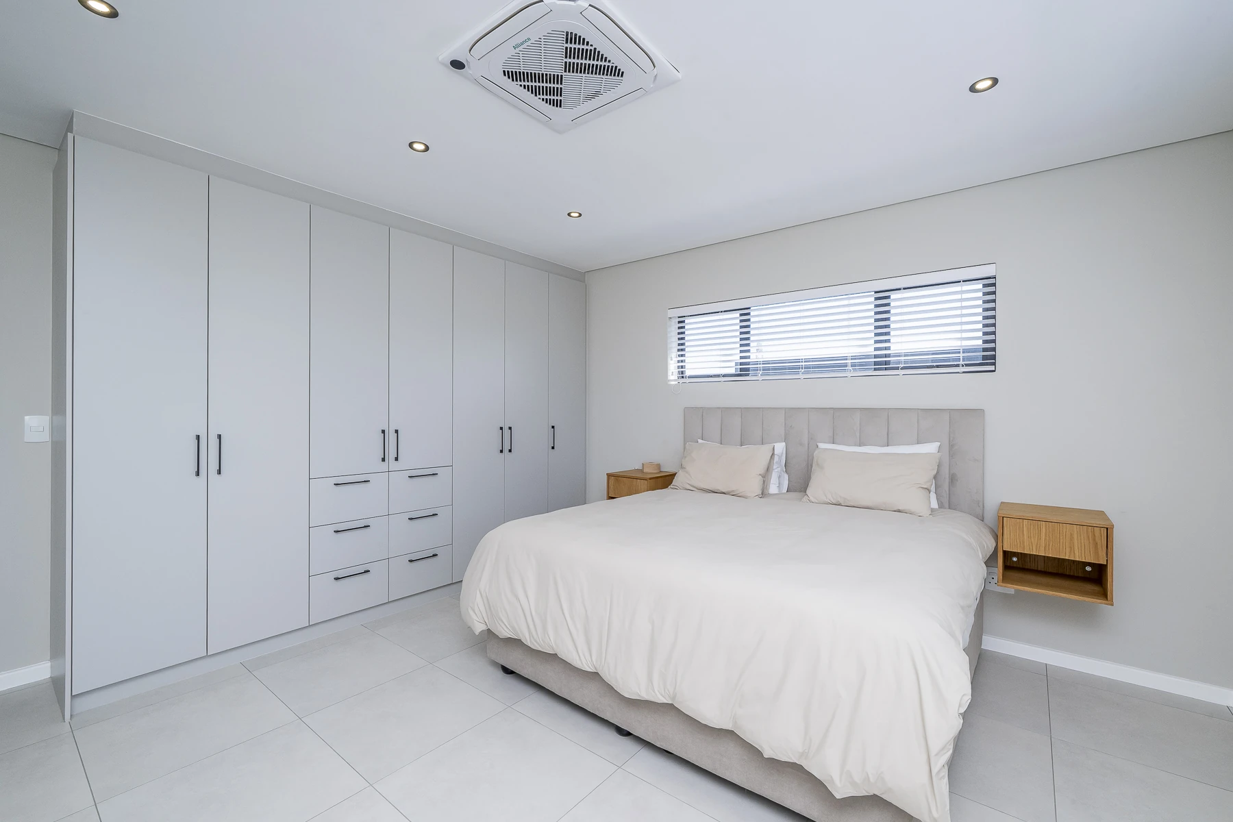 Master bedroom with wardrobes